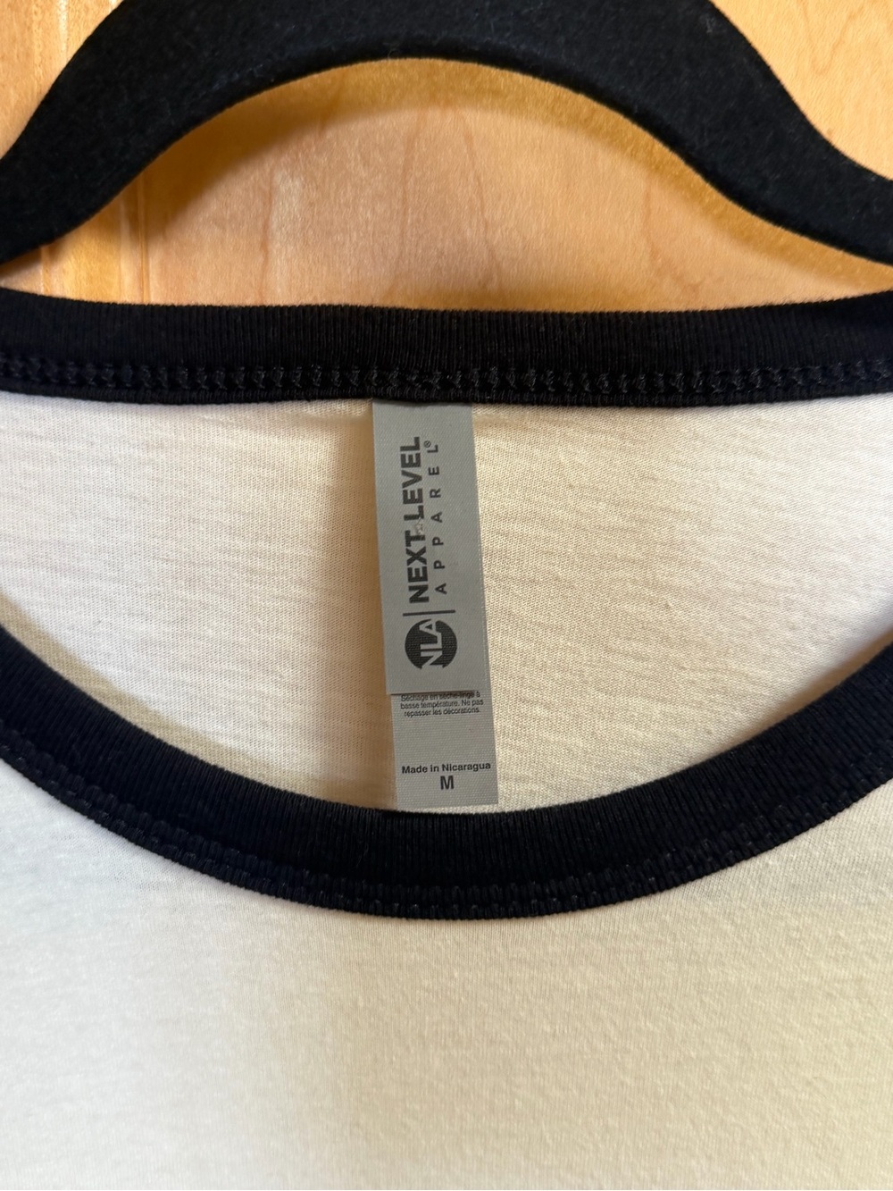 Next Level Apparel Cream Ringer Tee with Black Trim and Mushroom Graphic - Picture 3 of 3